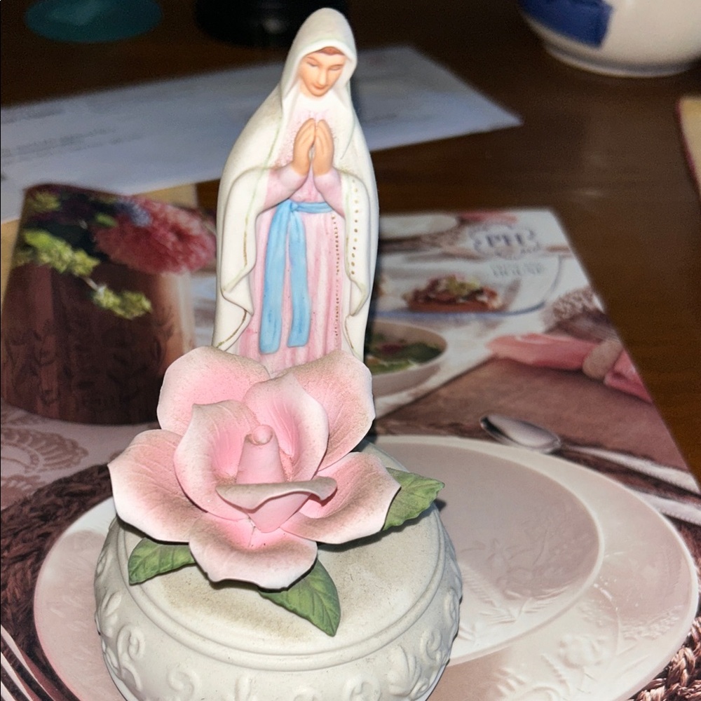 Religious Figurine with Pink Rose